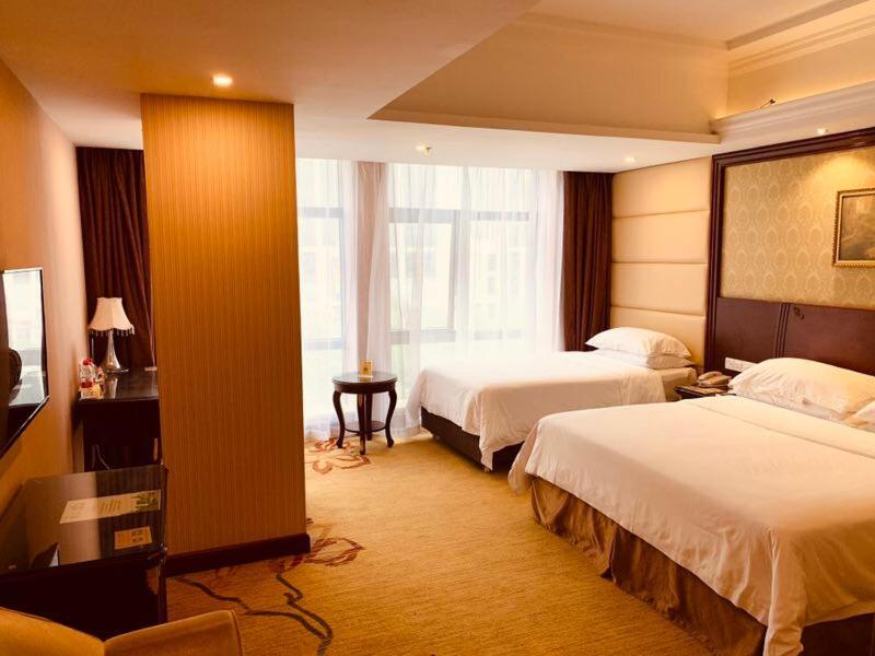 Vienna Hotel Shanghai Happy Valley Songjiang Esterno foto